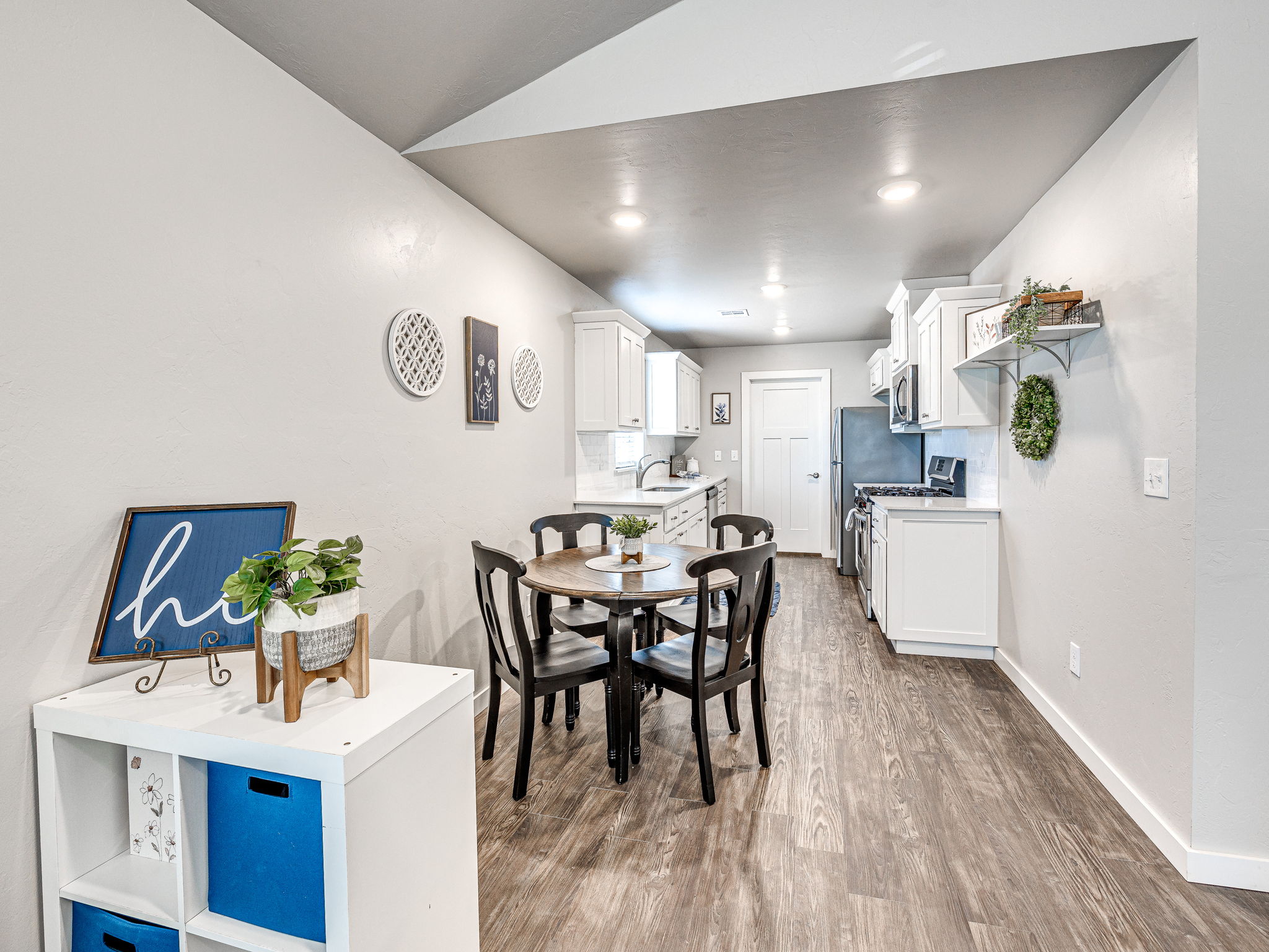 Staged dining area and kitchen